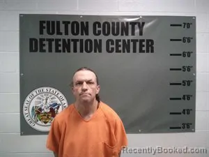 Mugshot of Russ Neal Mcmurtrey booked in Fulton County, Arkansas on August 11, 2026