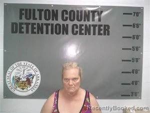 Mugshot of Penny Denise Spencer booked in Fulton County, Arkansas on August 21, 2026