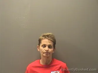 Mugshot of Angela Marie Agnew booked in Garland County, Arkansas on August 9, 2026