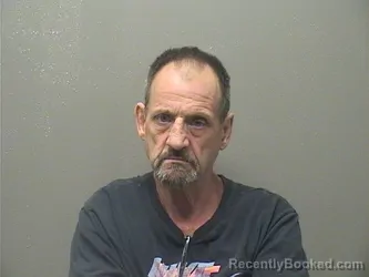 Mugshot of Roger Wayne Alred booked in Garland County, Arkansas on October 6, 2026
