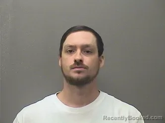 Mugshot of Dustin Edward Cole Black booked in Garland County, Arkansas on August 24, 2026