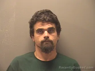 Mugshot of DUSTIN CALEB BUSBEE booked in Garland County, Arkansas on May 10, 2026
