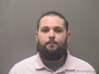 Mugshot of GARRETT ALAN BUCKHOLZ