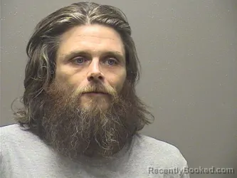 Mugshot of Justin Michael Belt booked in Garland County, Arkansas on August 16, 2026