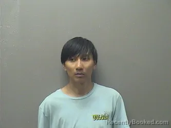 Mugshot of ANDREW THI CHAP booked in Garland County, Arkansas on April 4, 2026