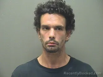 Mugshot of Kevin Cogburn booked in Garland County, Arkansas on September 25, 2026