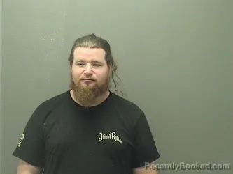 Mugshot of Noah Michael Cowger booked in Garland County, Arkansas on July 28, 2026