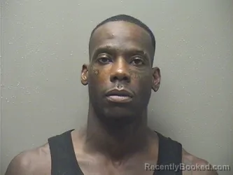 Mugshot of Xavier Liveil Charles booked in Garland County, Arkansas on August 18, 2026