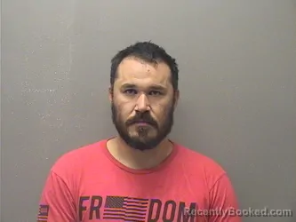 Mugshot of Zachrey Cox Cogburn booked in Garland County, Arkansas on August 14, 2026
