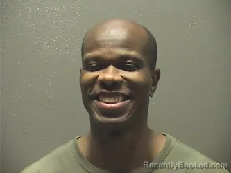 Mugshot of John Edward Douglas booked in Garland County, Arkansas on August 27, 2026