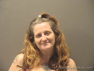 Mugshot of SARAH MICHELLE DEROQUE booked in Garland County, Arkansas on April 21, 2026