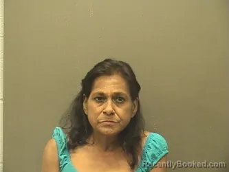 Mugshot of Esmeralda Martinez Escobar booked in Garland County, Arkansas on August 3, 2026