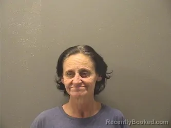 Mugshot of TAMMY LYNN FRADUE booked in Garland County, Arkansas on April 21, 2026