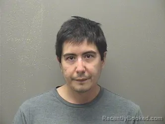 Mugshot of Corey Heath Holmes booked in Garland County, Arkansas on August 15, 2026