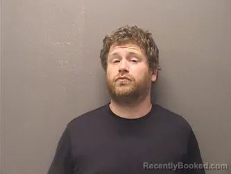 Mugshot of Justin Snowhill Hickman booked in Garland County, Arkansas on August 8, 2026