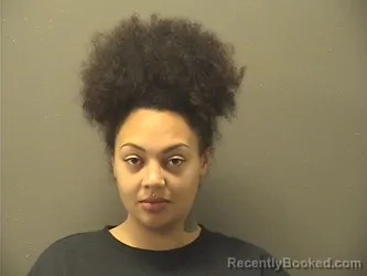 Mugshot of NADJIA CHEROKEERAIN HUGHES booked in Garland County, Arkansas on June 22, 2026
