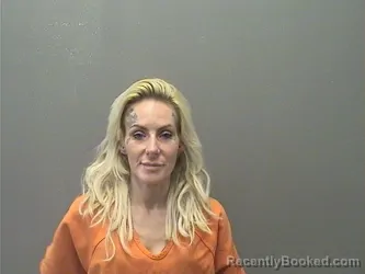 Mugshot of Natalie Tess Hubach booked in Garland County, Arkansas on August 3, 2026