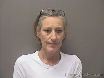 Mugshot of TIFFANY ANN HOWARD booked in Garland County, Arkansas on May 27, 2026