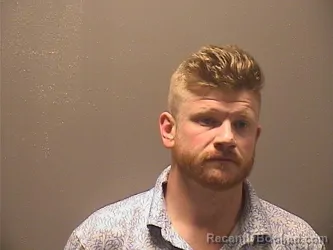Mugshot of Briar Lyndon Jackson booked in Garland County, Arkansas on August 23, 2026
