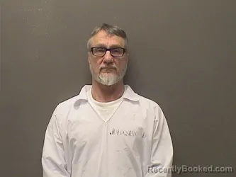 Mugshot of Dennis Edward Johnson booked in Garland County, Arkansas on September 29, 2026