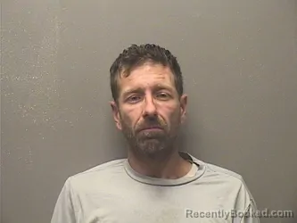 Mugshot of JUSTIN MICHAEL JONES booked in Garland County, Arkansas on April 20, 2026