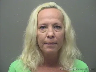 Mugshot of Raquel Conrad Kloss booked in Garland County, Arkansas on September 30, 2026