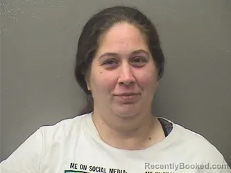 Mugshot of TIFFANY DENISE KNIGHT booked in Garland County, Arkansas on April 19, 2026