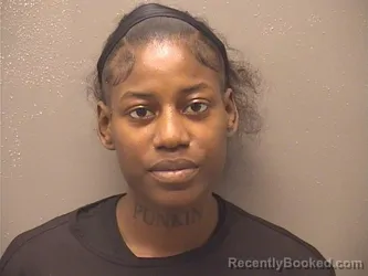 Mugshot of Anitsha Kaniya Lewis booked in Garland County, Arkansas on August 16, 2026