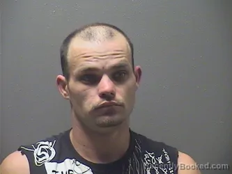 Mugshot of JONATHAN BLAKE MCFARLANE booked in Garland County, Arkansas on April 8, 2026