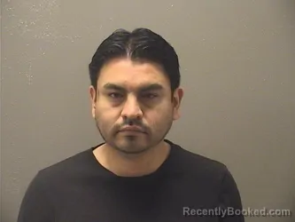 Mugshot of JUAN MONFIL booked in Garland County, Arkansas on May 11, 2026