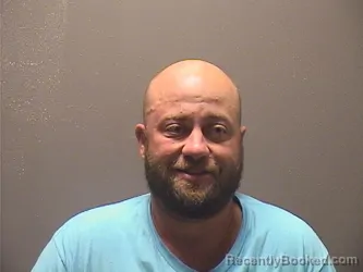Mugshot of Justin Curtis Mcelyea booked in Garland County, Arkansas on August 30, 2026