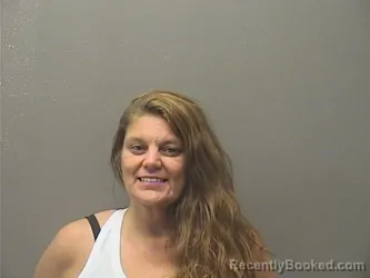 Mugshot of MICHELLE ELIZABETH MATTHEWS booked in Garland County, Arkansas on July 7, 2026