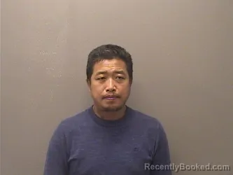 Mugshot of Thang Lian Mang booked in Garland County, Arkansas on August 13, 2026