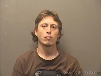 Mugshot of SOUTHONE BLAKE PHOTHISANE booked in Garland County, Arkansas on May 24, 2026