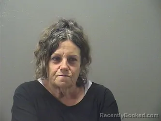 Mugshot of SHARON LYNN RABUSHKA booked in Garland County, Arkansas on April 26, 2026