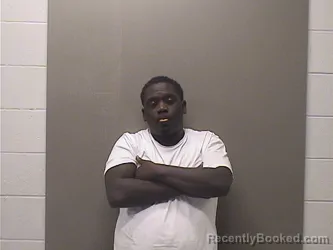 Mugshot of Alex Kianta Sims booked in Garland County, Arkansas on October 8, 2026