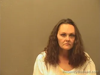 Mugshot of Jessica Marie Stinnett booked in Garland County, Arkansas on October 5, 2026