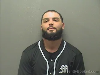 Mugshot of Malik Keyshawn Smith booked in Garland County, Arkansas on August 29, 2026
