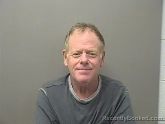 Mugshot of John Curtis Thames booked in Garland County, Arkansas on October 11, 2026