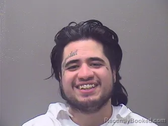 Mugshot of AUSTIN LEE WARREN booked in Garland County, Arkansas on May 13, 2026