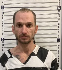 Mugshot of JUSTIN LUEKER