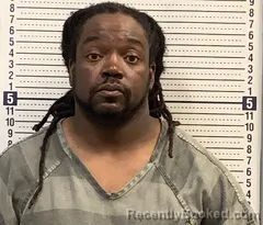 Mugshot of JUSTIN WOMACK booked in Greene County, Arkansas on June 21, 2026