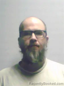 Mugshot of Justin Edward Holowell