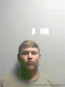 Mugshot of John L Rhoades