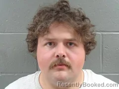 Mugshot of TRACE COSSEY booked in Izard County, Arkansas on March 28, 2026