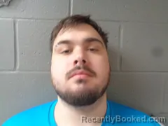 Mugshot of MATTHEW DORE booked in Izard County, Arkansas on April 21, 2026