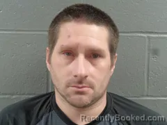 Mugshot of JUSTIN ADAMS booked in Izard County, Arkansas on April 24, 2026