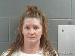 Mugshot of JENNIFER POLLARD booked in Izard County, Arkansas on April 28, 2026