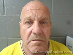 Mugshot of BRENTON MCCURLEY booked in Izard County, Arkansas on June 17, 2026