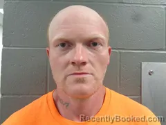 Mugshot of TYLER BURNS booked in Izard County, Arkansas on July 27, 2026